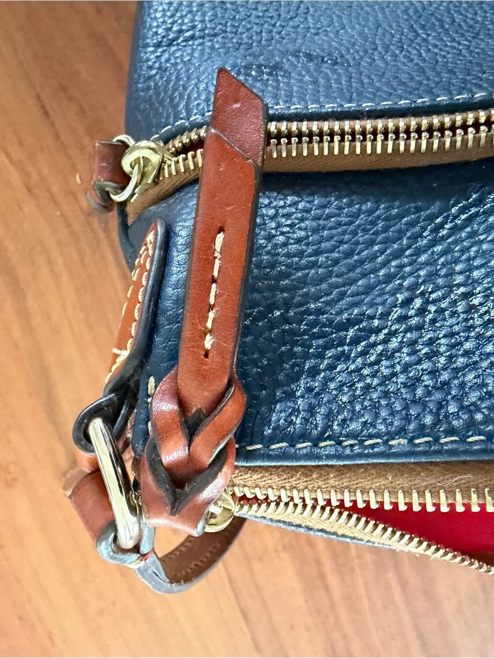 Dooney & Bourke Black Pebbled Leather Crossbody with Brown Trim & Gold Plate